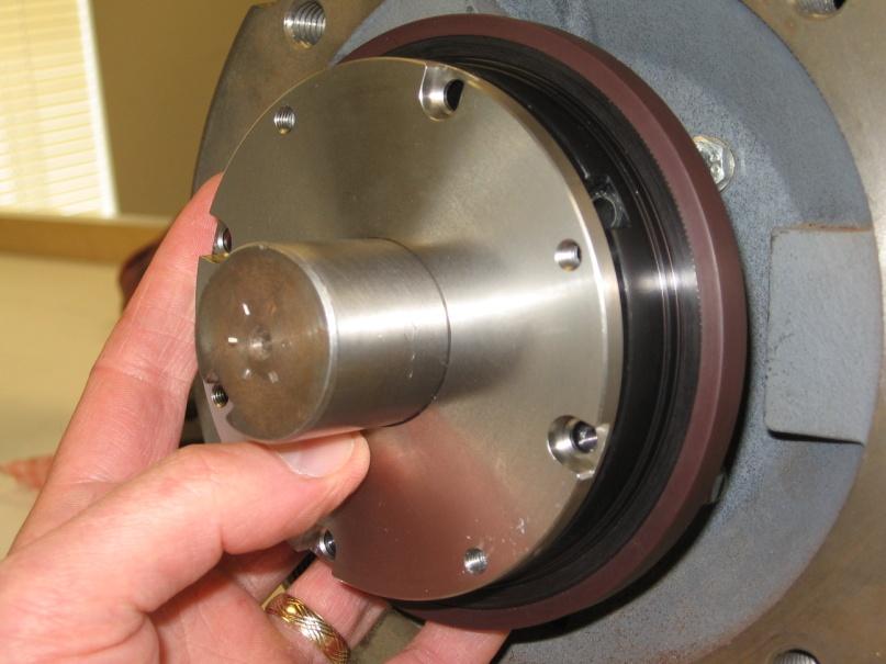 Step 4 Part 3 of Clamp Wheel Installation Slide clamping plate (with 4 recessed holes