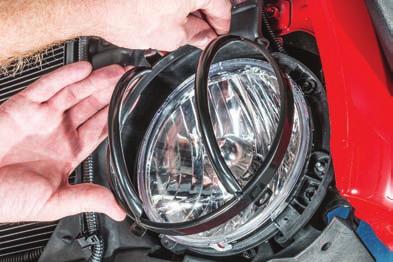 Using a T15 Torx screw driver, remove the factory headlight trim ring on each headlight (Fig 8).