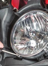 Starting from left to right, tighten each screw an even amount to pull the Euro-Guard tight onto the headlight (Fig 1). Repeat for the other headlight.