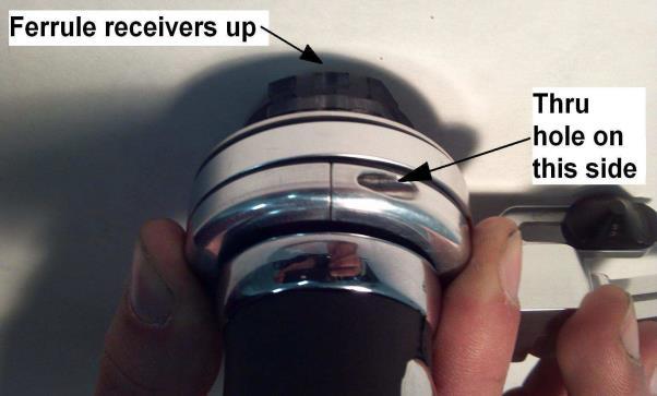 Place a small flathead screwdriver to lift the cable up while holding the