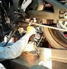 Replace nut and tighten securely 2) Slide muffler over header and push fully up to stop ring on the header. Use a little light oil on the slip joint to ease assembly.