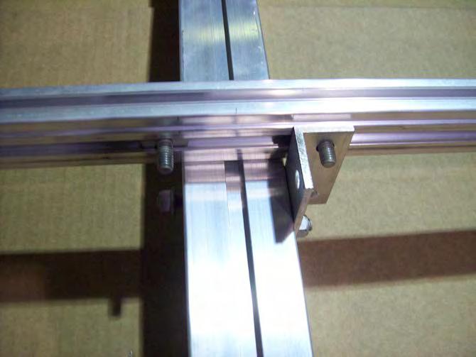 Rear cross member shown Set the frame assembly on top of the tongue with