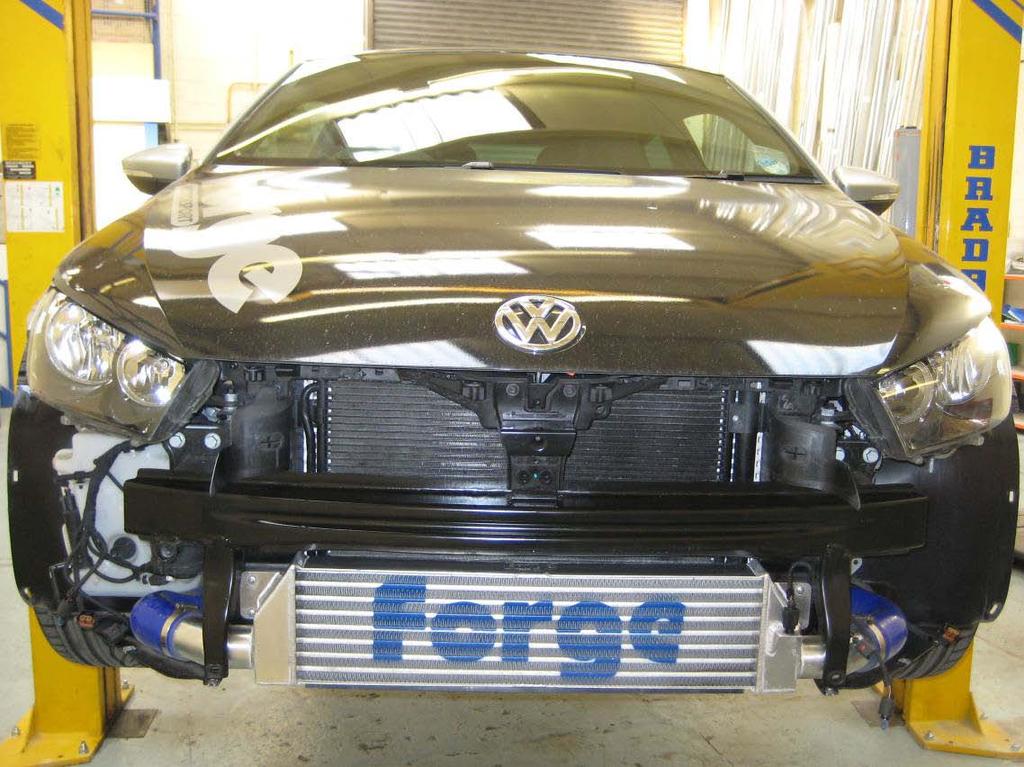 26. Installation is now complete! Follow steps 9-1 in reverse order to refit the bumper. Lower the car to the ground and enjoy your new found performance!