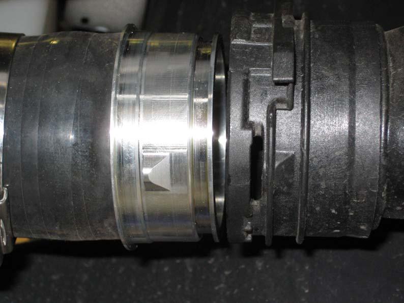 It s easiest to get the smaller coupler in first, then bend the hose to get the other end into the stock intercooler.