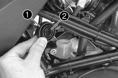MAINTENANCE WORK ON CHASSIS AND ENGINE 105 Never use DOT 5 brake fluid! It is silicone-based and purple in color. Oil seals and brake lines are not designed for DOT 5 brake fluid.