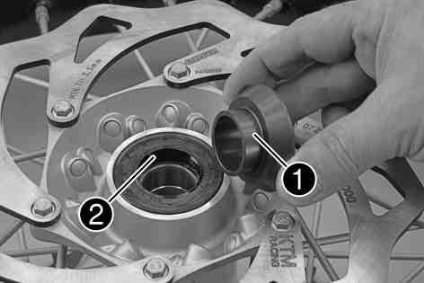 MAINTENANCE WORK ON CHASSIS AND ENGINE 111 100269-10 Check the wheel bearing for damage and wear.» If the wheel bearing is damaged or worn: Replace the wheel bearing. x Remove bushing.