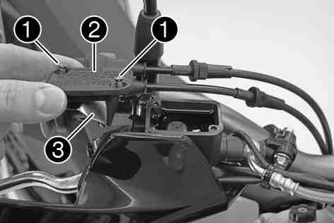 MAINTENANCE WORK ON CHASSIS AND ENGINE 97 Move the brake fluid reservoir mounted on the handlebar to a horizontal position. Remove screws.