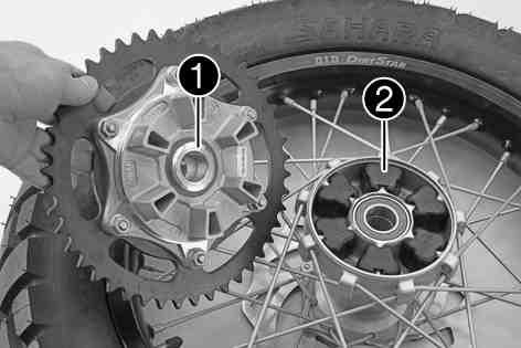 WHEELS, TIRES 111 Main work Check bearing1.» If the bearing is damaged or worn: Replace the bearings.x Check rubber dampers2of the rear hub for damage and wear.