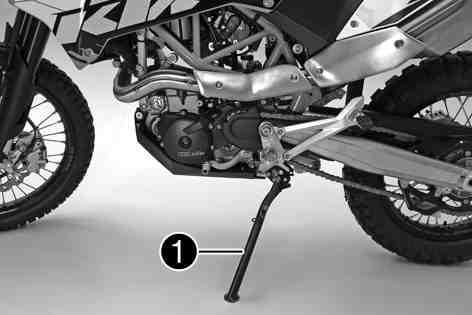 The side stand must be folded up during motorcycle use. The side stand is coupled with the safety electric starter system - see the riding instructions.