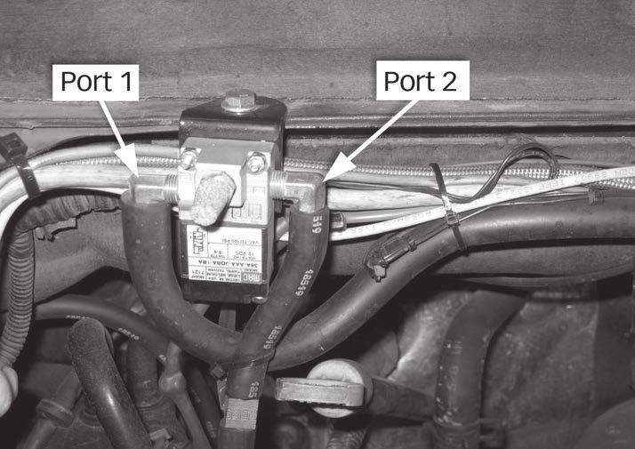 Section 3 Vacuum Solenoid and Relay Installation 1. Locate the rail along the top rear of the engine compartment.