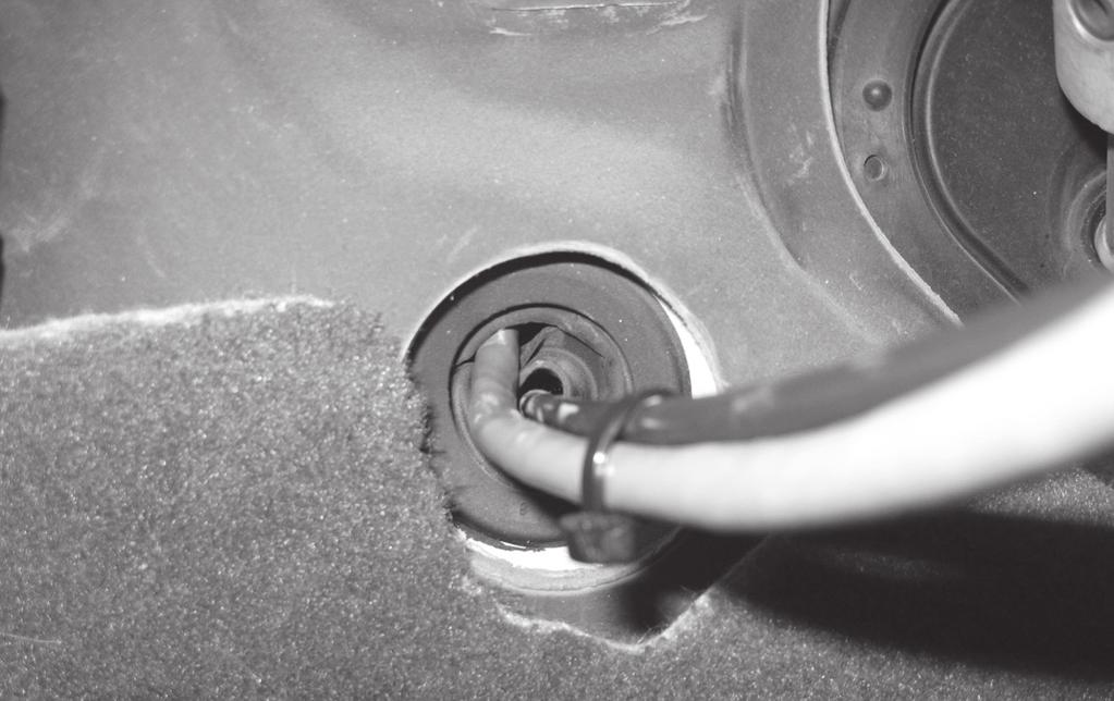 Figure 24 12. From the engine compartment, push the Brake Switch Connector through the hole cut in the grommet. 13.