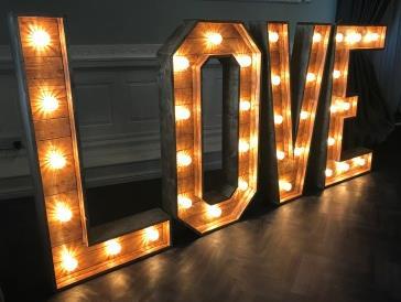 There are multiples of the popular alphabet letters with this and extra can be purchase from us if required RUSTIC Illuminated wood finish LOVE Letters These rough cut wood effect