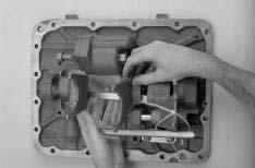 Transmission Overhaul Procedures-Bench Service 5. Install the detent key (it has rounded, protruding notches) from the front of the shift bar housing.