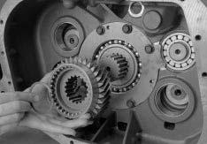 Transmission Overhaul Procedures-Bench Service How to Remove the Auxiliary Drive Gear Assembly Special Instructions None Special Tools Typical service tools Bearing Retainer Bearing Auxiliary Drive
