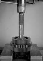 Due to its narrow width, it may break. 1 2. Place the countershaft assembly in a press as shown.