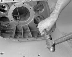 Transmission Overhaul Procedures-Bench Service How to Assemble the Lower Reverse Idler Gear Assembly Special Instructions The new reverse idler shaft uses a snap ring in place of the capscrew.