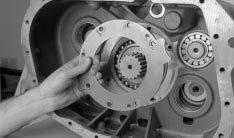 Transmission Overhaul Procedures-Bench Service 6. Place a flanged-end bearing driver (Tool ref. ID T10) over the countershaft rear bearing, and drive the bearing into the case bore.