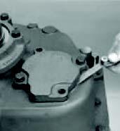 Transmission Overhaul Procedures-Bench Service 6. Rotate the output shaft 4 times clockwise and 4 times counterclockwise. The rotation will seat and align the rollers in each tapered bearing.