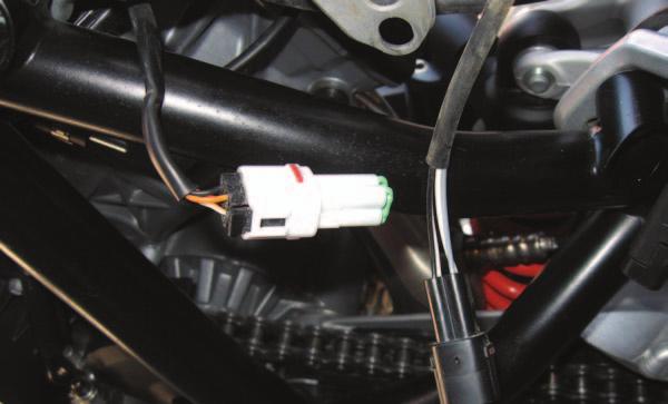 FIG.M 17 Unplug the stock Rear O2 sensor from the main wiring harness (Fig. M).