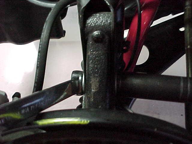 4) Use a 19mm socket and wrench to