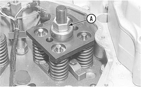 Refer to Disassembly and Assembly, Electronic Unit Injector - Remove. Illustration 38 3. Install the remainder of Tooling (A).