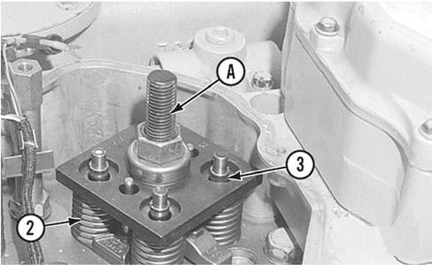 This procedure can be performed on only one cylinder at a time. This will prevent the inlet valves and the exhaust valves from falling into the cylinder. 1.