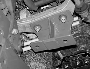 Place differential bracket to the differential housing and remove the appropriate 5 housing bolts.