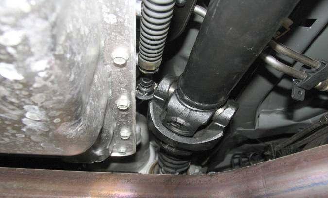 driveshaft slip yoke. Install but do not tighten boot output shaft clamp.