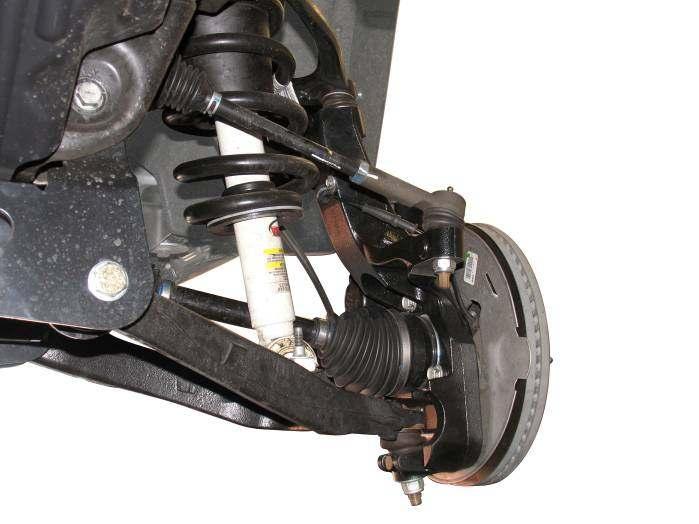 Attach the hub, splash guard and ABS wire steering knuckle RS176710 with the original hardware. Tighten the hub mounting bolts to 133 ft. lbs.