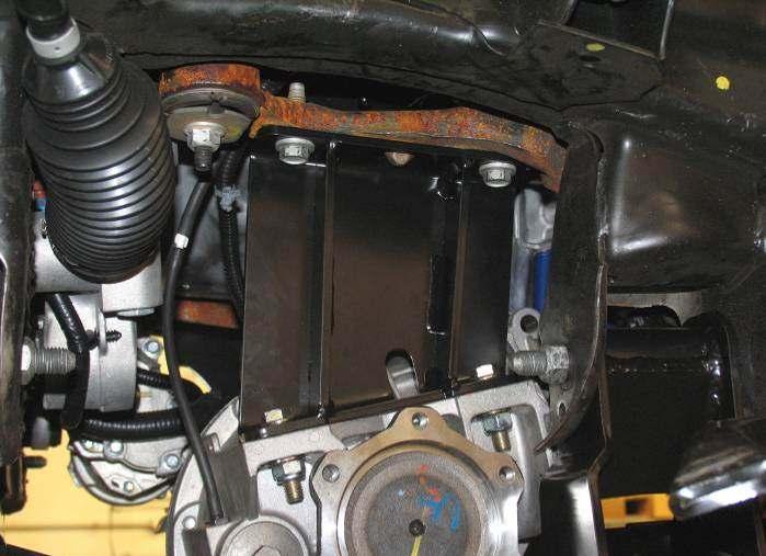 Tighten nuts and bolts to 65 ft. lbs. WARNING: Verify that the right drop bracket RS176713 or axle tube mount does not contact the steering rack or steering rack electrical connections.