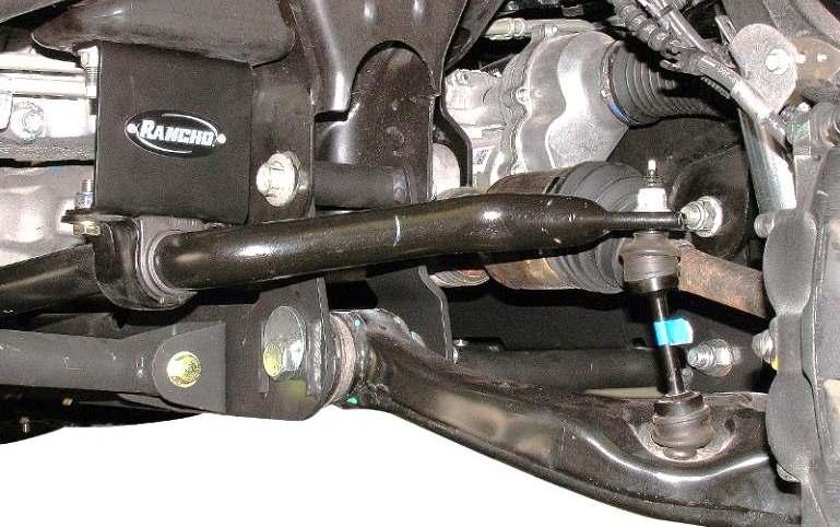 RS860506 1) Attach sway bar drop brackets RS176746B to the frame with the original hardware. Tighten the nuts to 35 ft. lbs.