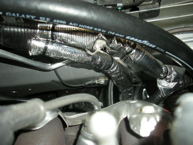 Replace the alternator and belt and reposition alternator cable to allow as much room as possible for the