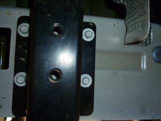 8. Remove the 4 bolts holding the bumper support to the frame of the vehicle