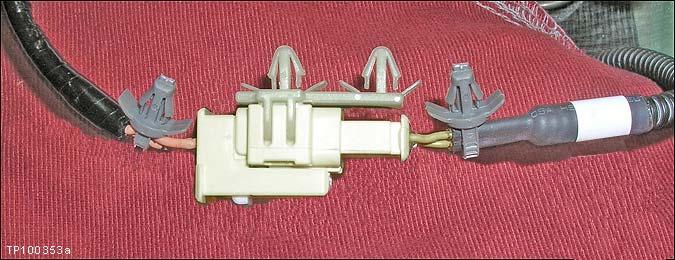 SEDAN 7. Reinstall the connector mounting clip (see Figure 5a). 8. Install 2 mounting clip type tie-wraps as shown in Figure 5a.