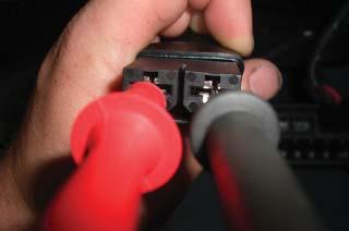If the voltage meter reads full voltage, then replace the jumper cable.