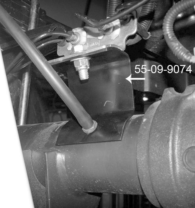 FORM #9076.04-011315 PRINTED IN U.S.A. PAGE 9 OF 11 31) REAR BRAKE LINE BRACKET [SEE PHOTO] Unclip the rear axle vent hose from the top frame lip and re-clip to the bottom frame lip.