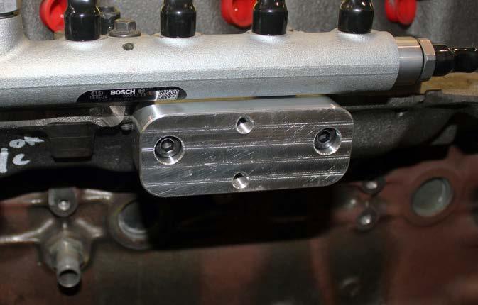 STEP 12 Locate the supplied fuel distribution mounting block and (2) M8 hex head bolts.