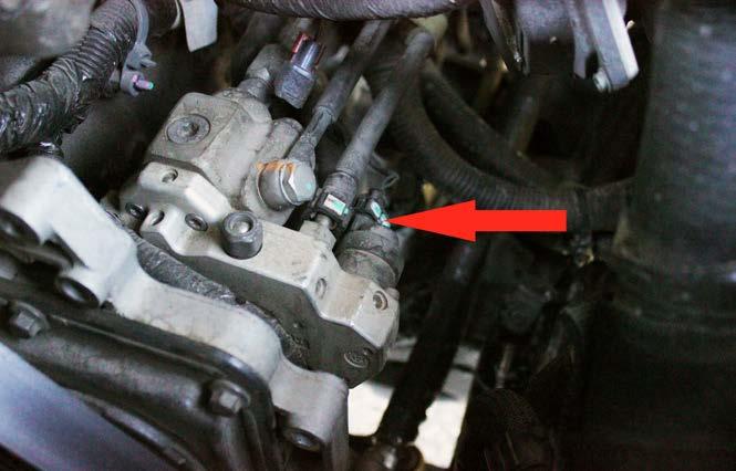 STEP 14 Reconnect the electrical connection to the factory fuel rail pressure sensor.
