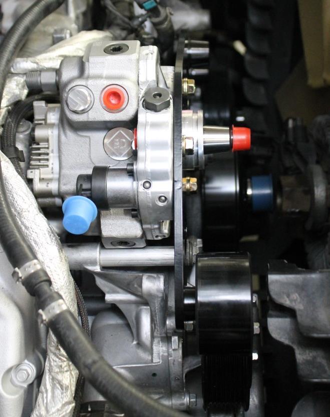 S437. 26. Torque all bolts from bracket to engine to 18 ft-lbs, using a 13mm socket.