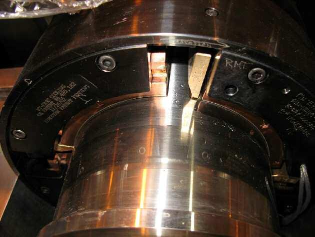 The actual bearing is shown in Figure 3. Note that this design does not use end seals. Also of note is the huge discharge opening between pads to enable the oil to easily exit the bearing.