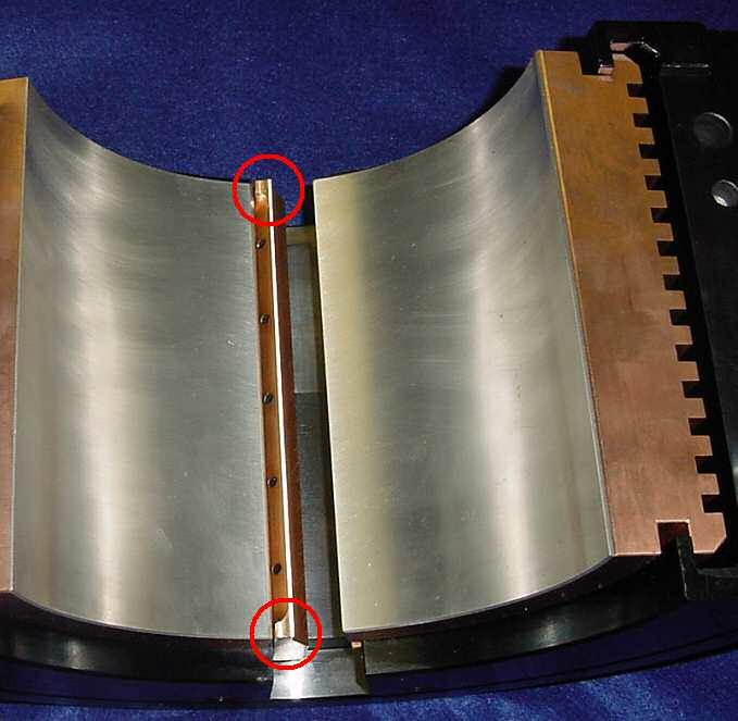 TILTING PAD JOURNAL BEARING STARVATION EFFECTS 7 The minimum oil lubricating flow requirement for operation at 435 f/s with the evacuated design is 36 gpm calculated as described in the OIL FLOW