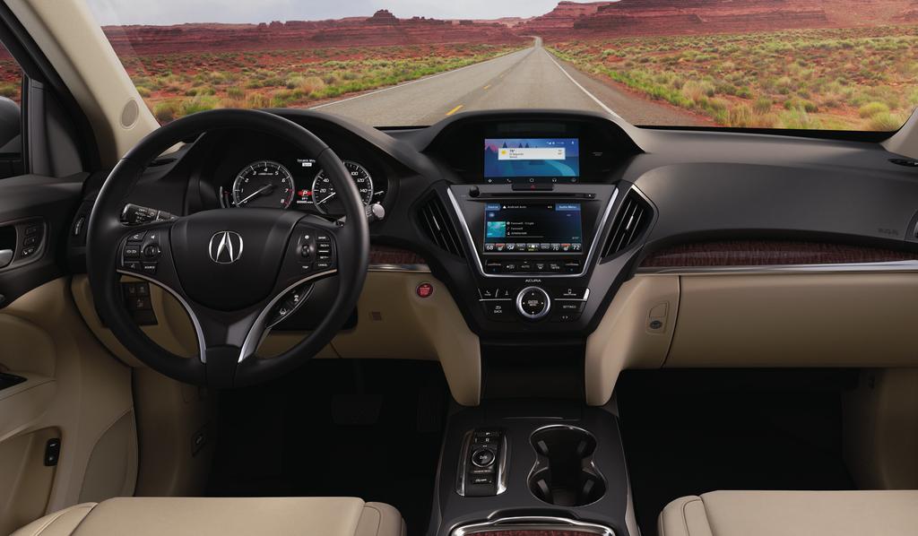 NEVER DRIVE ALONE The MDX was designed not only to intimately connect the driver to the road, but also the vehicle to the driver.