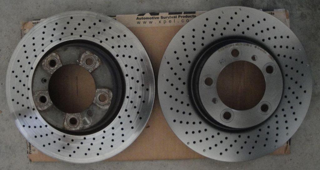 I did not weight the two rotors to see if there was any differences. I suspect that both rotor types are very identical, with perhaps a slight advantage to the Brembo rotors which seemed better built.