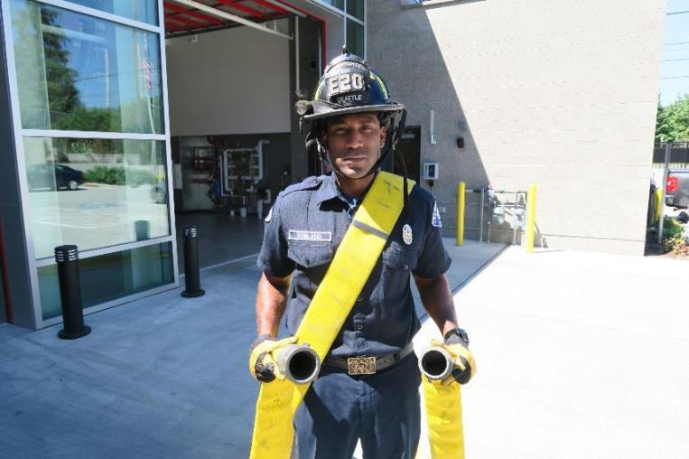Having the hose marked at the 50-foot mark allows the firefighter to quickly locate the center of the hose length and drape it across his chest.