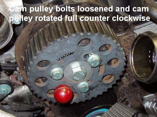 If you're trying to pull hard on it to get it over the water pump, then you don't have the tensioner properly positioned, or the cam pulley wasn t fully counterclockwise when the belt was looped over