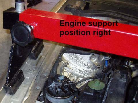 the power steering reservoir with its hose,