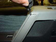 Fig 4 5) Pry off trim piece located on door grab handle using PGF stick.