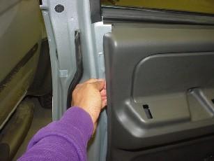 Fig 6 Fig 7 8) Using your hands, grasp the entire door trim at its rear edge and pull trim apart from door sheet metal using considerable amount of force to disengage the plastic panel fasteners.