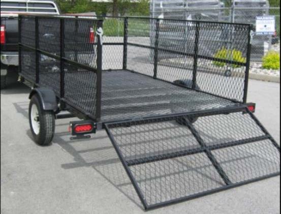 We have designed this trailer so that the loading ramps, hook on over the rear trailer frame for rear loading or