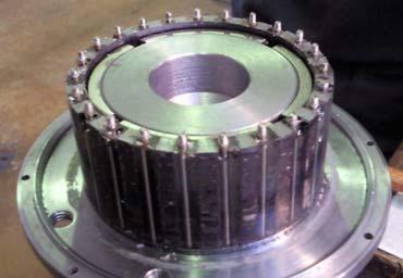 most mechanical machines the shafts of the machine (or rotors) are supported by two bearings at each end of the shaft, in the case of the magnetic box this is not practical because the two rotors are